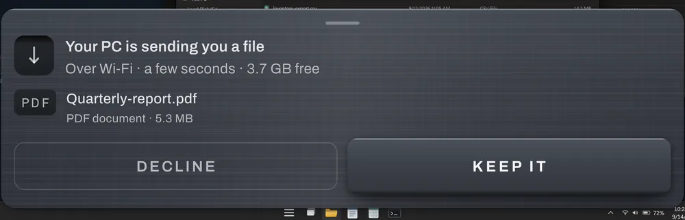 The phone's receive sheet: Your PC is sending you a file, Quarterly-report.pdf, with Decline and Keep it.